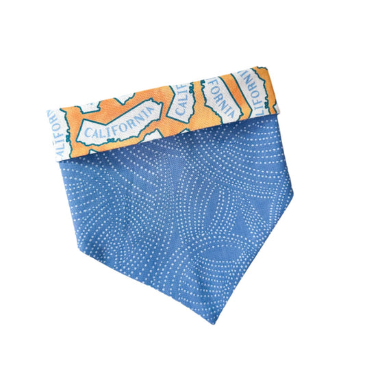 Blue bandana with a colorful California-themed pattern on a white surface